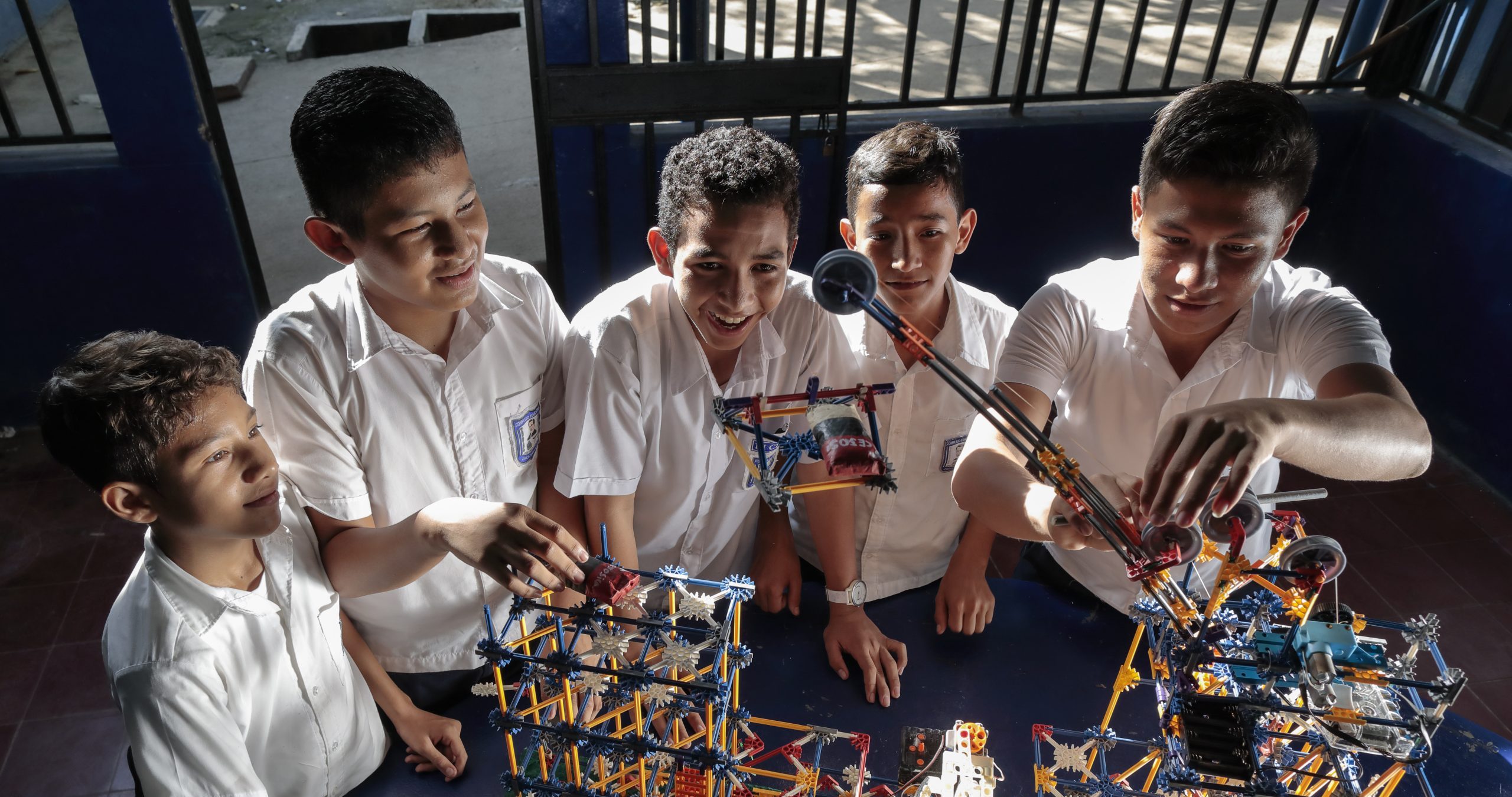 Students in El Salvador building with a connector set